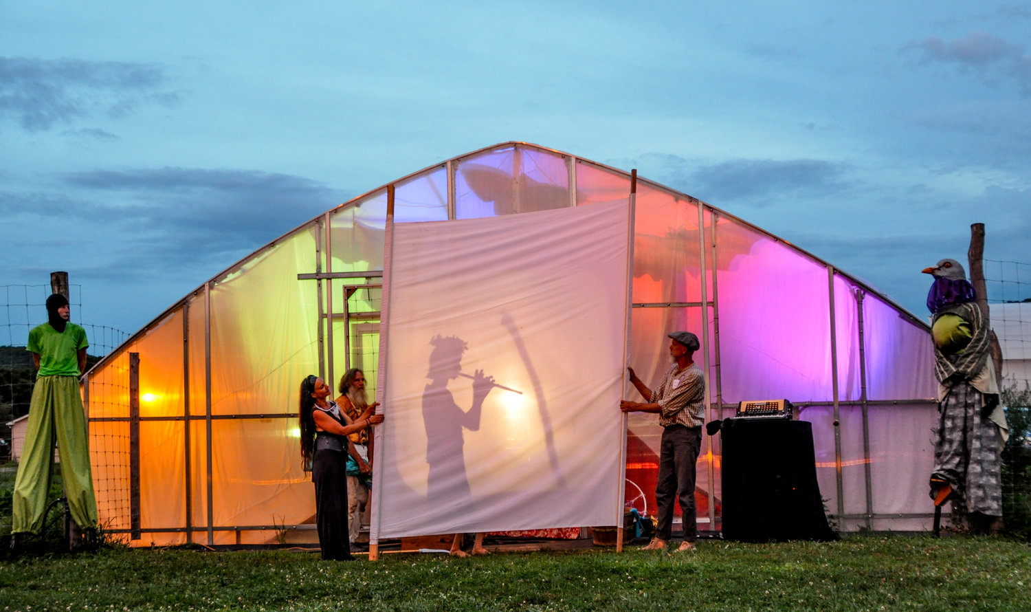 The second act of “Dream on the Farm” is a shadow play presentation of a past extinction with a climactic warning.